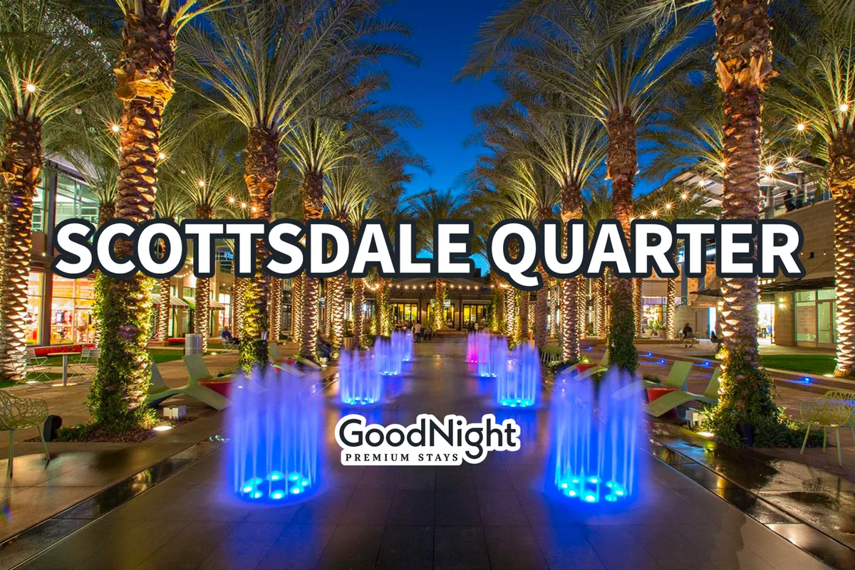 A lively shopping district bustling with energy, featuring colorful water fountains, palm trees, and inviting storefronts. The scene promises upscale dining, shopping, and social opportunities close to the estate.